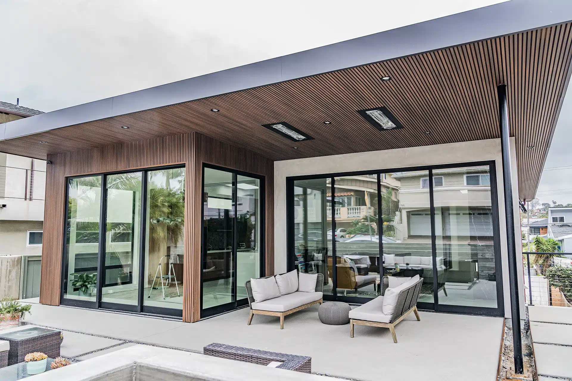 modern home with brown european style siding