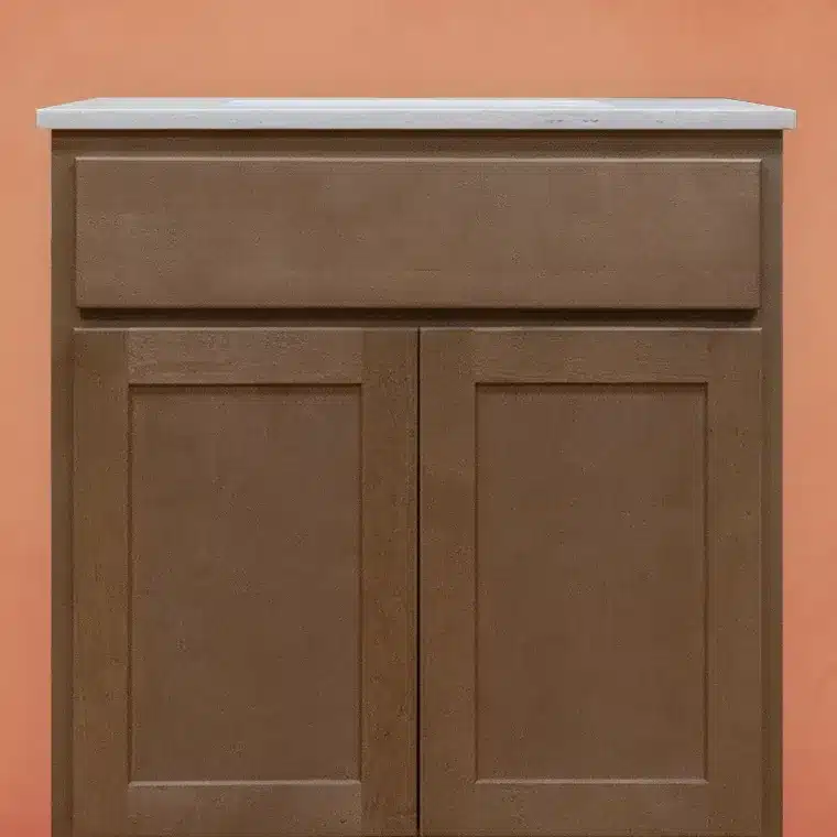 front side of smoked cashew stained cabinet with off white vanity top