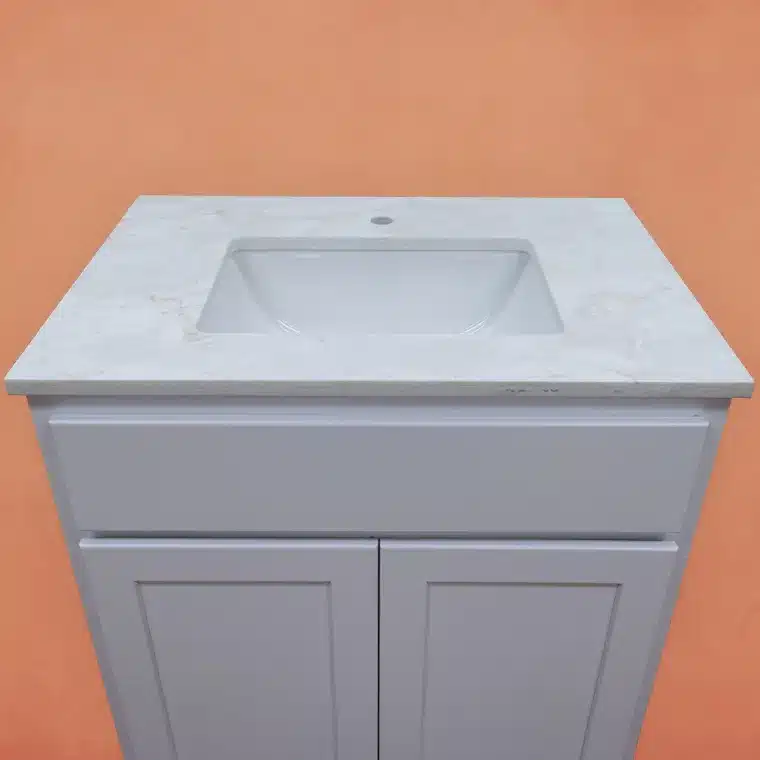 overview of white cabinet with off white vanity top